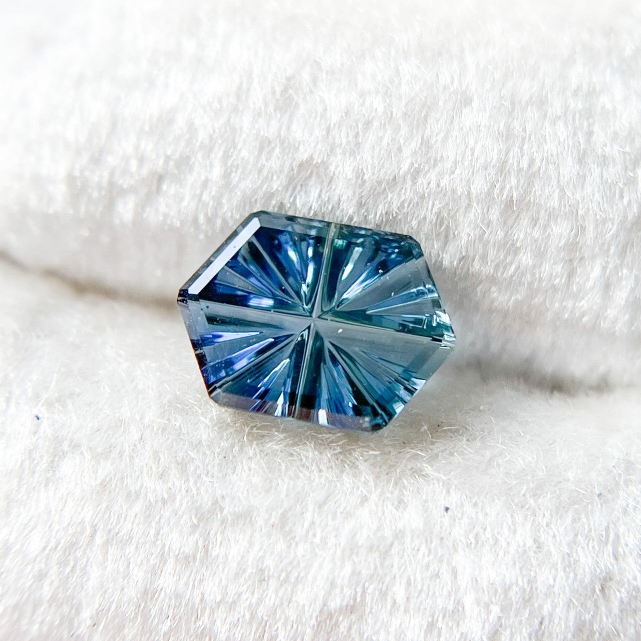 Brilliant Teal Blue Hexagon Sapphire StarBrite™ Cut by John Dyer