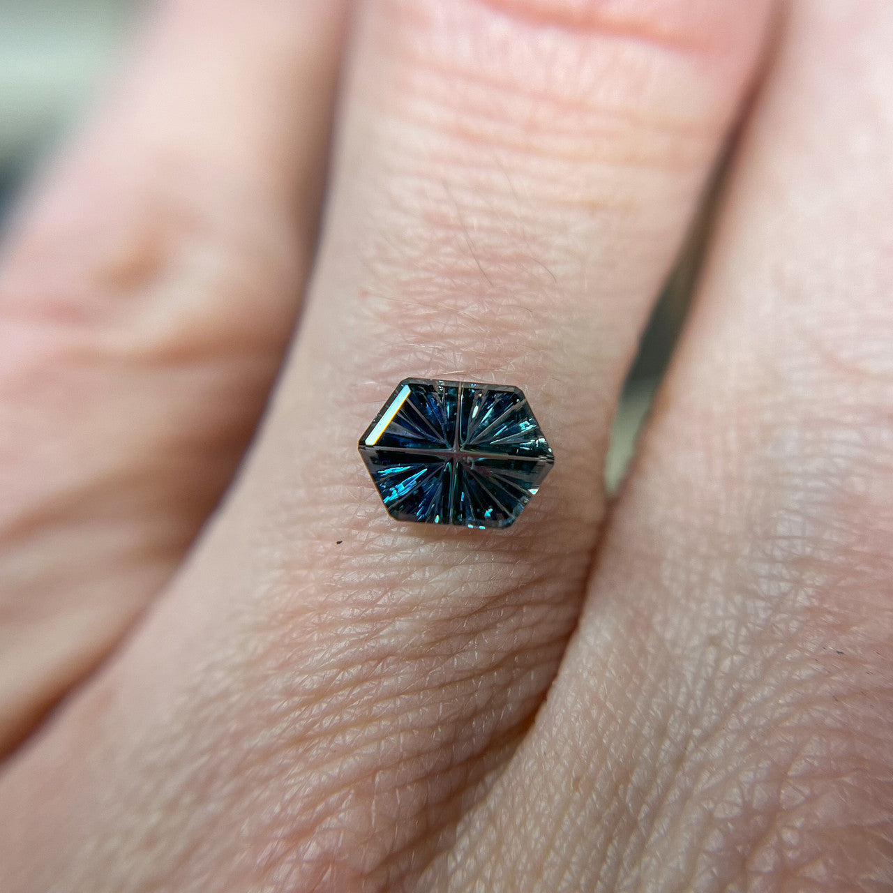 Brilliant Teal Blue Hexagon Sapphire StarBrite™ Cut by John Dyer