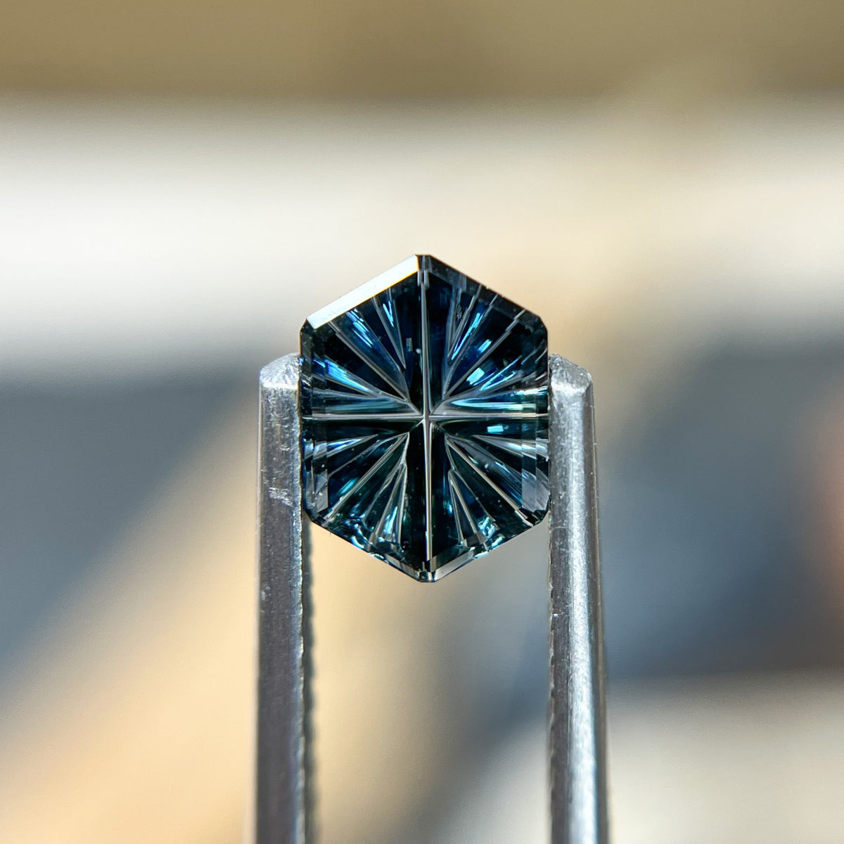 Brilliant Teal Blue Hexagon Sapphire StarBrite™ Cut by John Dyer