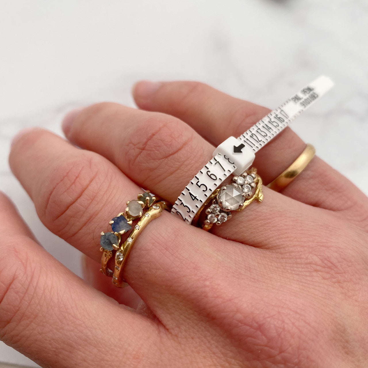 Request an engagement ring sizer from Olivia Ewing Jewelry