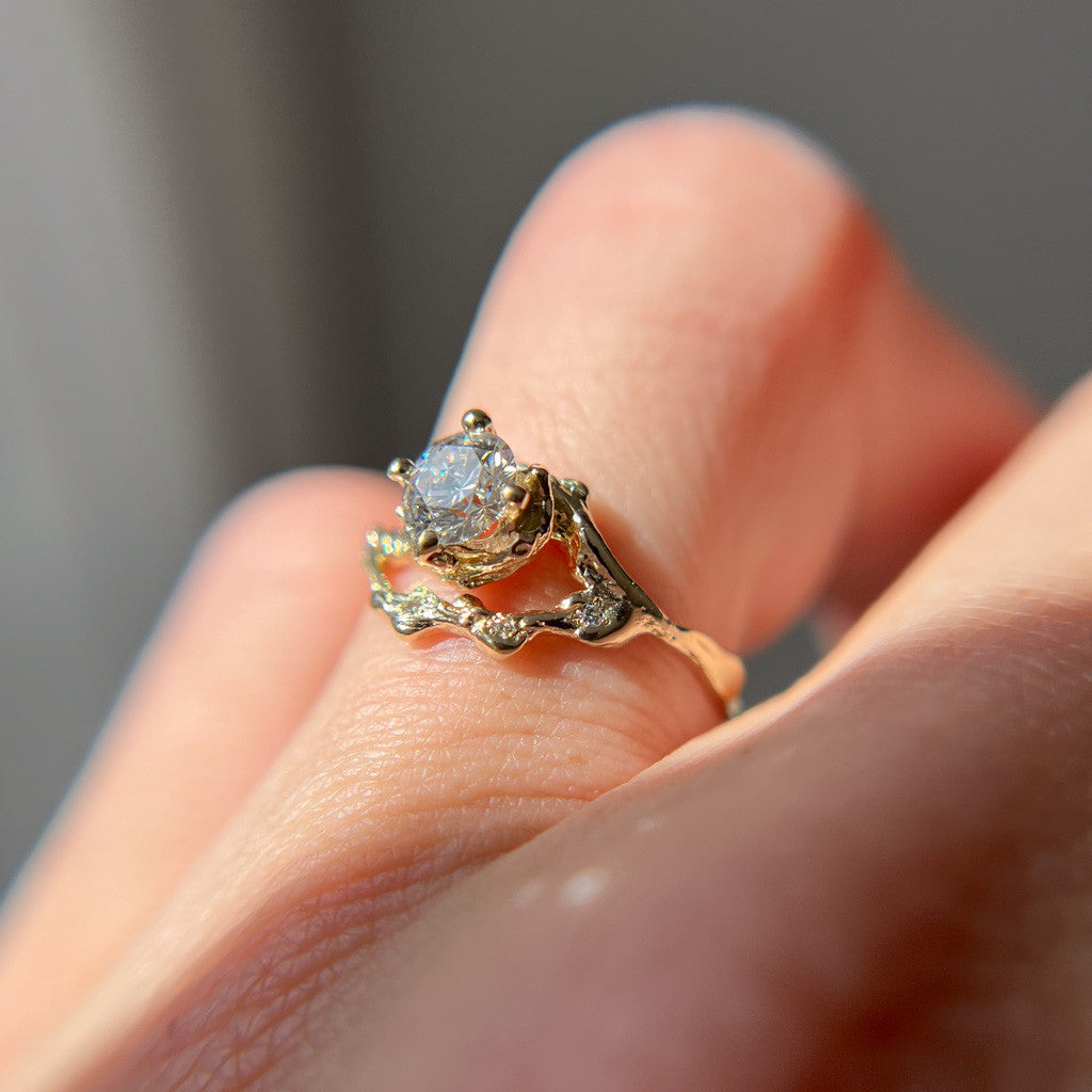 Demi Naples Moissanite Half Halo Ring
