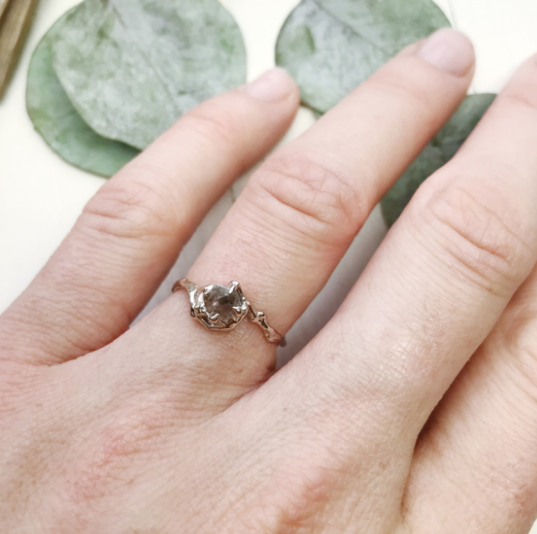 rough diamond engagement ring eucalyptus rough diamond engagement ring with nature inspired band and a eucalyptus leaf background