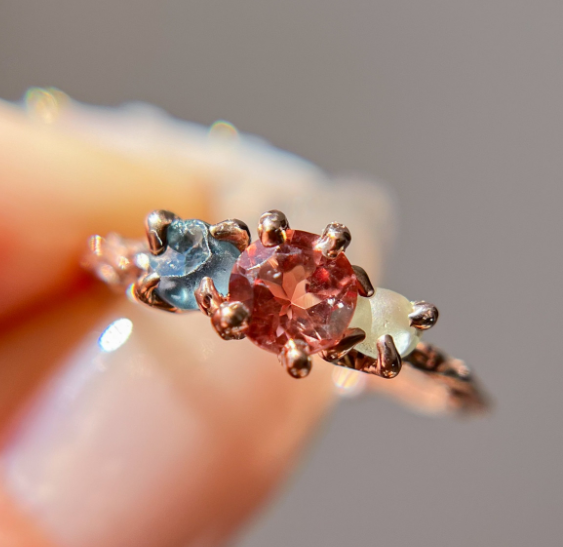 Naples Oregon center stone surrounded by two Montana sapphires